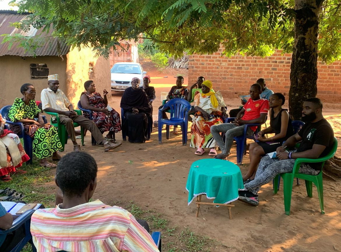 Community VSLA group in front of the salon